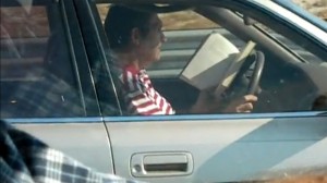 reading a book while driving